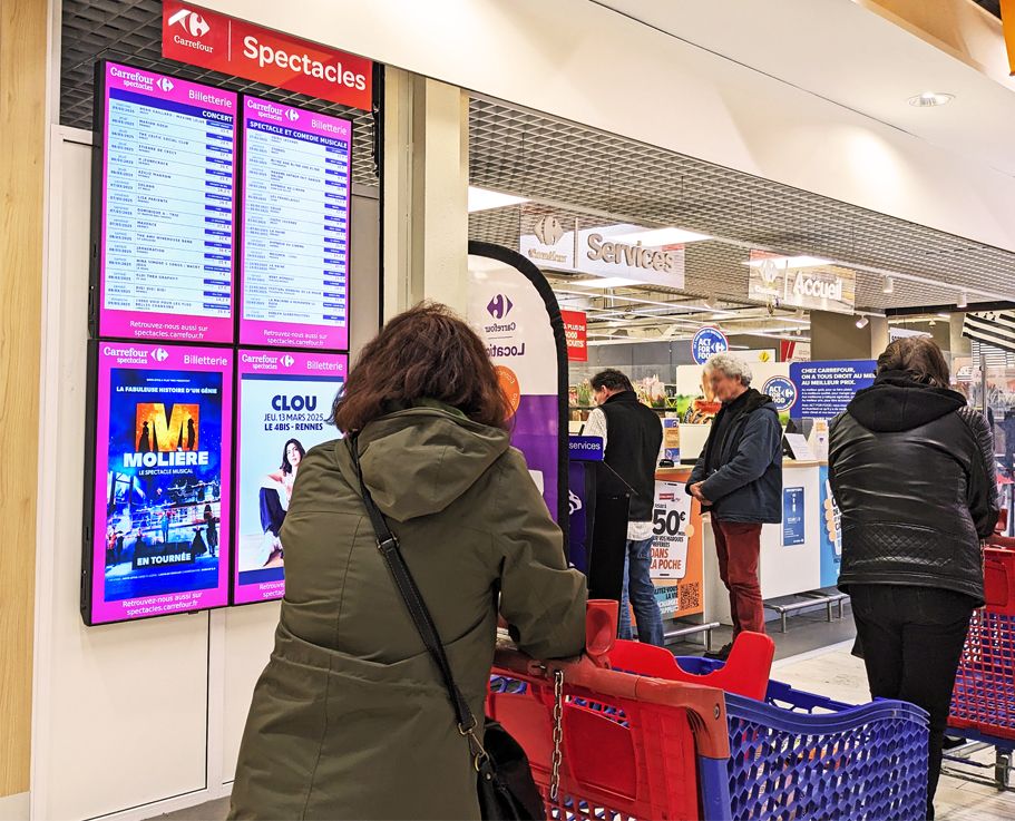 Affichage dynamique via des écrans en magasin pour la gestion de la billetterie culturelle chez Carrefour Spectacles